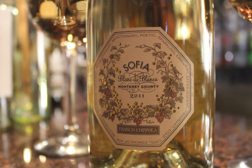 Close-up of a Sofia Blanc de Blancs sparkling wine bottle label on the bar